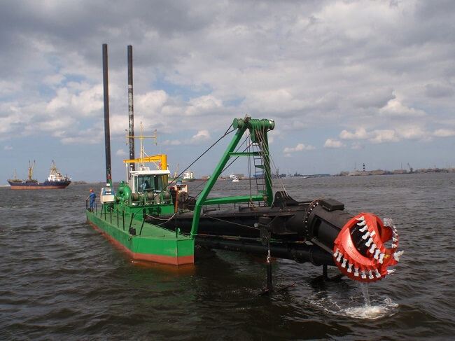 Cutter suction dredge removing silt from an inland lake